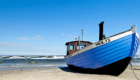 Rügen - Ferienhaus Wiekend Boot am Strand
