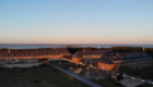 Sylt - Ferienhäuser Immenhus und Raanhus von Oben mit der Nordsee im Hintergrund bei Sonnenuntergang